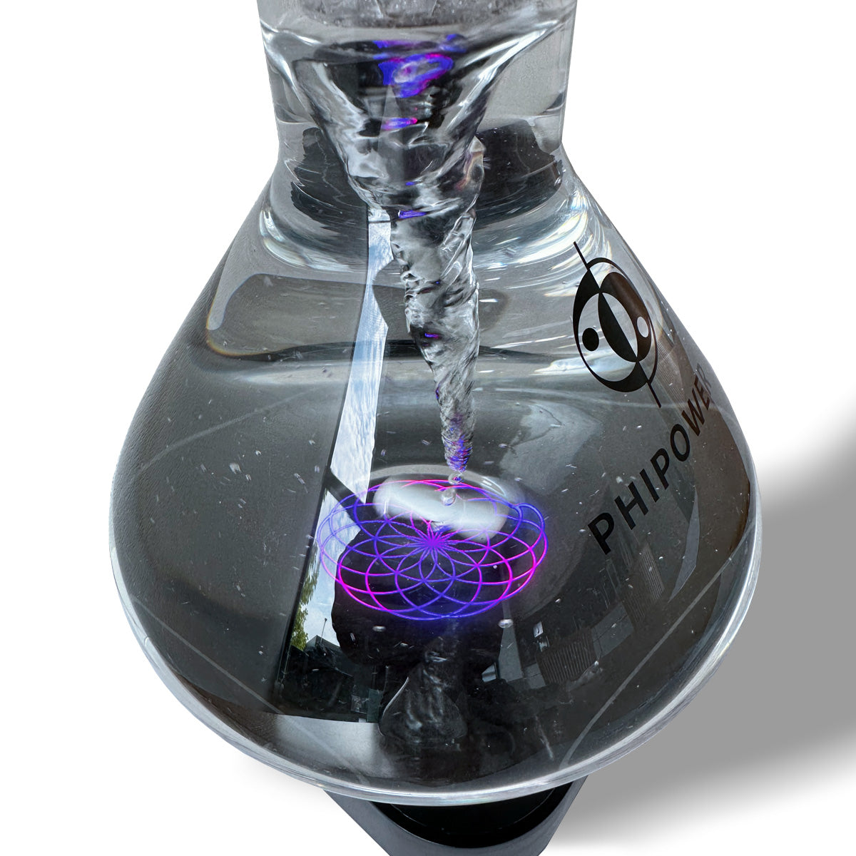 Detail of the Phipower Water Vitalizer's vortex chamber with light frequencies and Eternal Flower of Life symbol