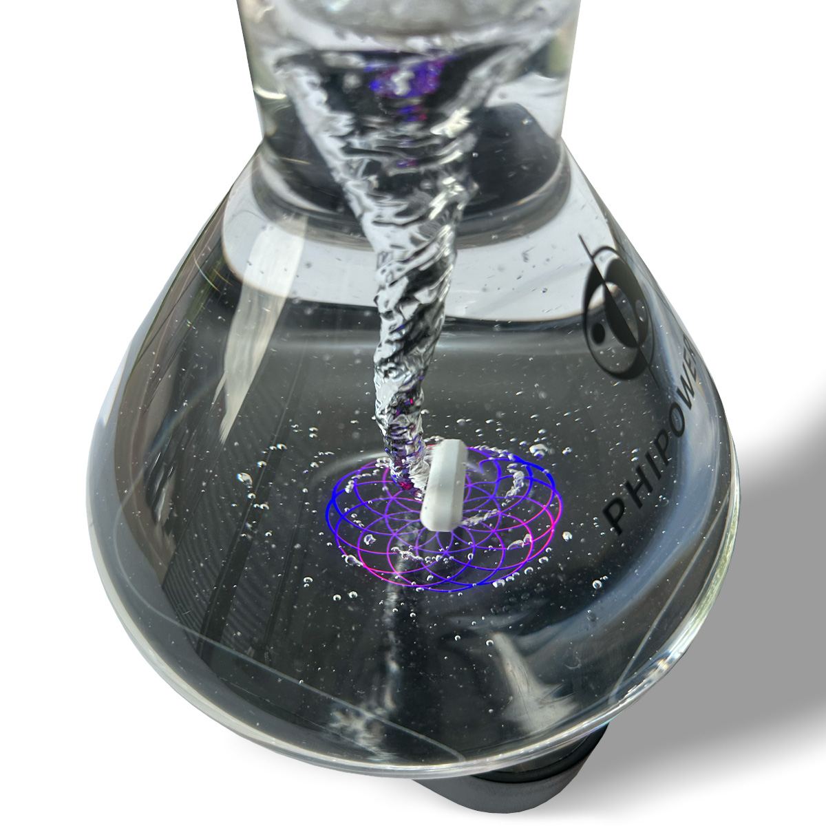 Illuminated water vortex above the Lotus of Life symbol